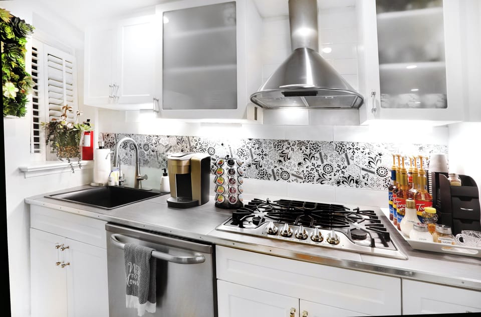 FULLY STOCKED KITCHEN WITH ALL APPLIANCES AND GAS COOKING