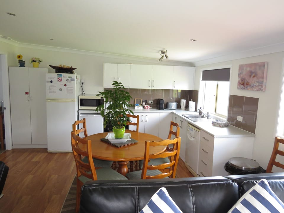 Kitchen Dinning Area.  Table can extend for extra guest.