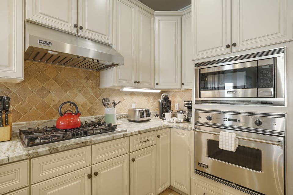 High end Viking Kitchen Appliances with a gas top range to prepare your favorite dishes for the whole family