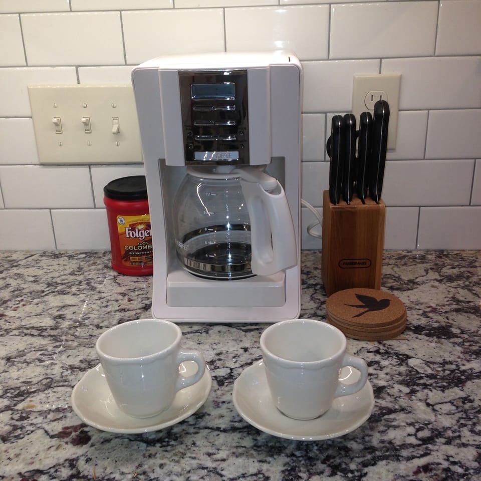 coffee maker with coffee provided.  Step stool provided to reach upper cabinets.
