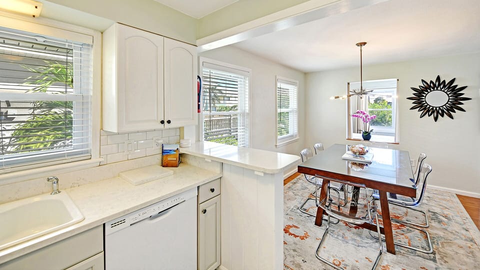 Dining room seats six comfortably, off the kitchen in an open floor plan, ideal 