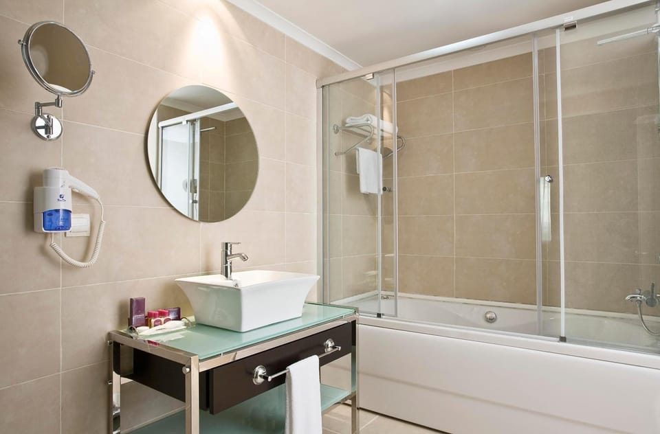 Combined shower/tub, free toiletries, hair dryer, bathrobes
