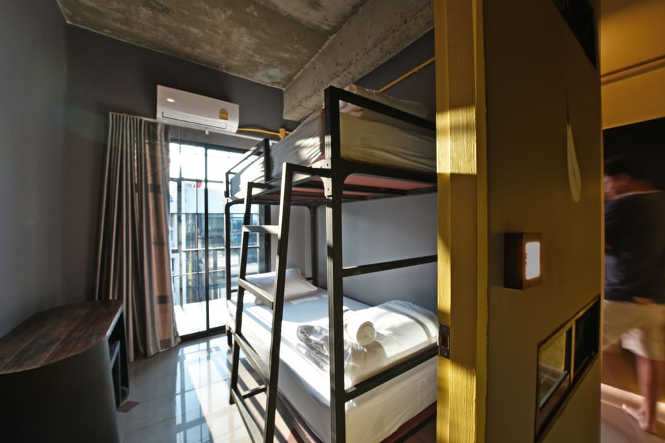 Bunk Bed Private Room with Balcony | Soundproofing, free WiFi, bed sheets