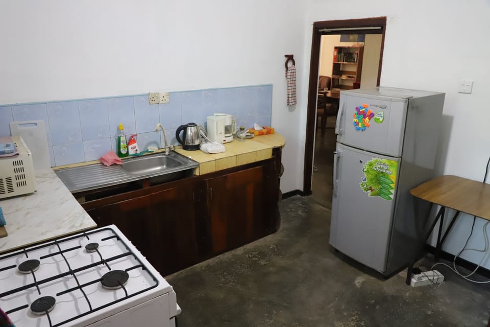 Shared fridge, microwave, oven, coffee/tea maker