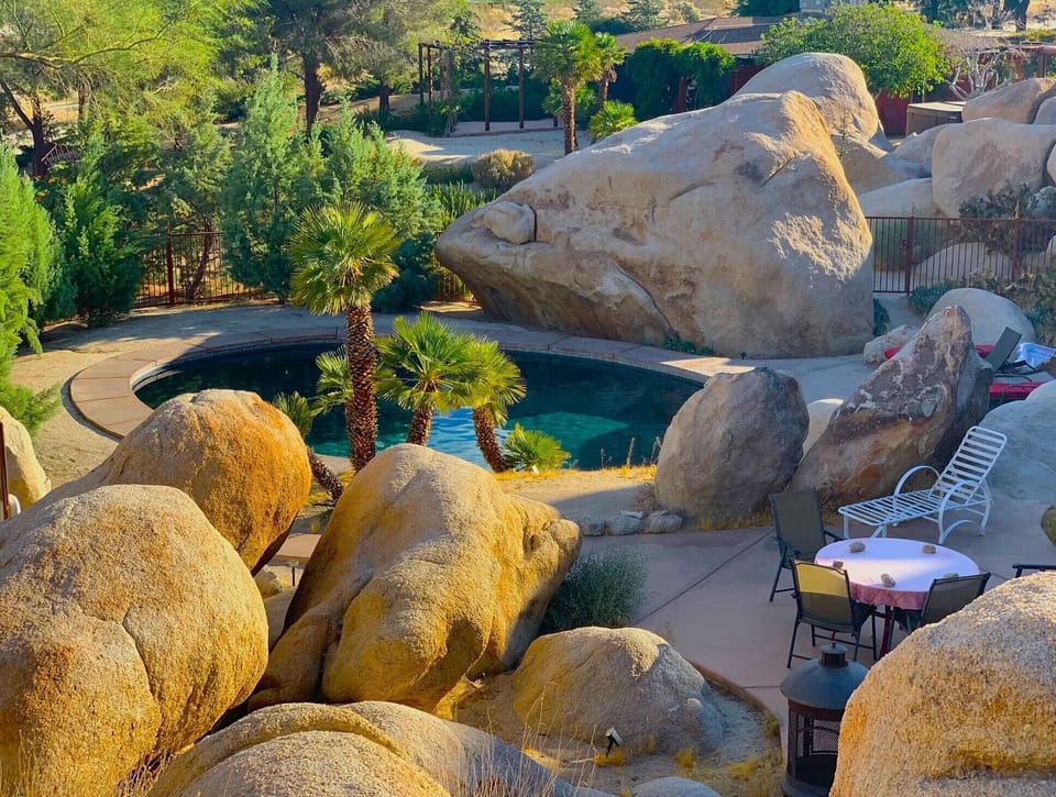 View of pool from canyon that opens to our Valley of the Moon with many caves.