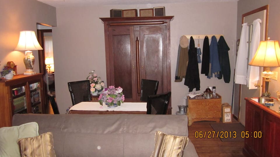 Living room Sofa & Eating game area & entry coat hooks & bench seat view South 
