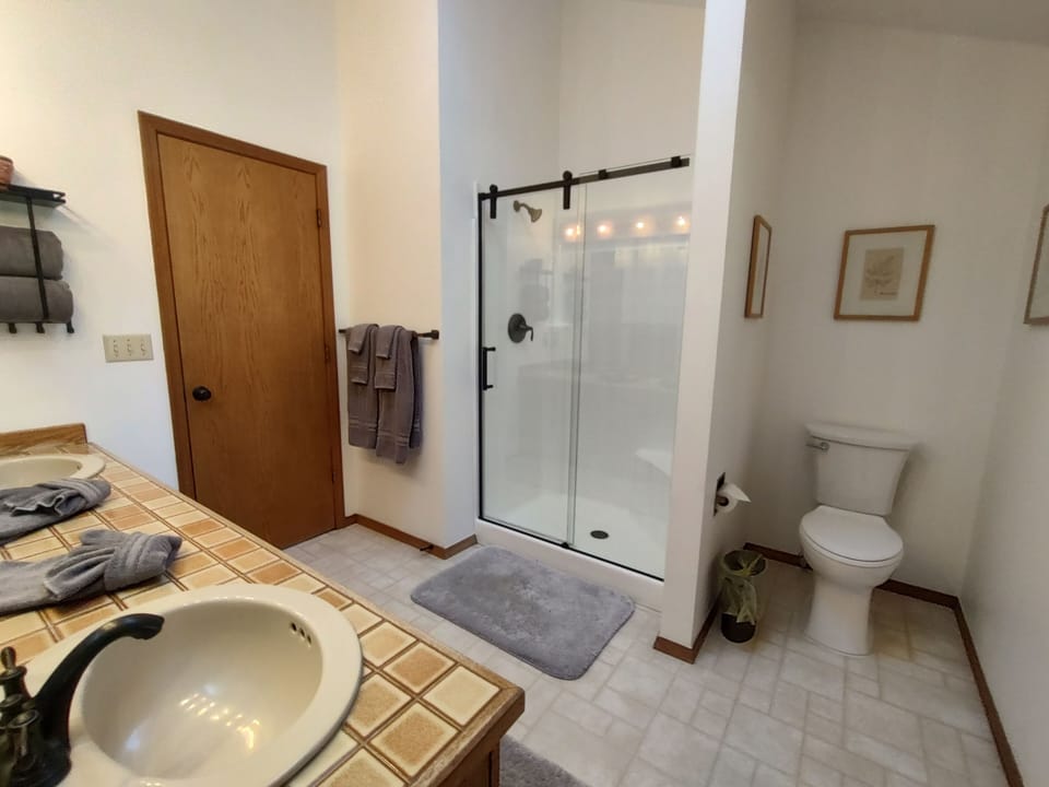 Upstairs Master Bathroom with private and shared access