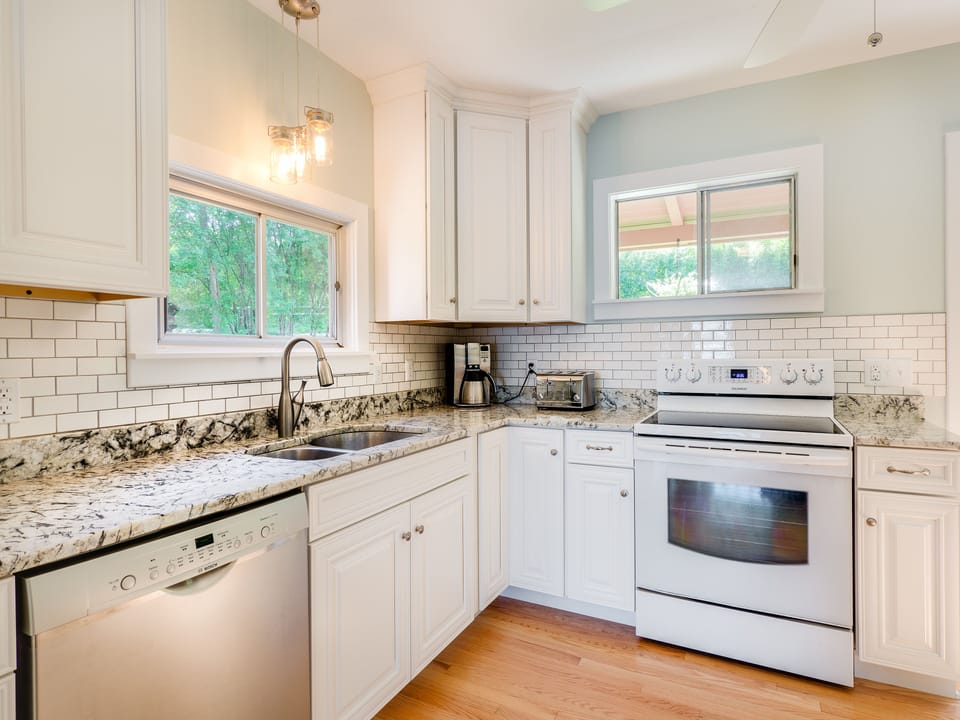No roughing it at WoM - enjoy the new dishwasher and garbage disposal.