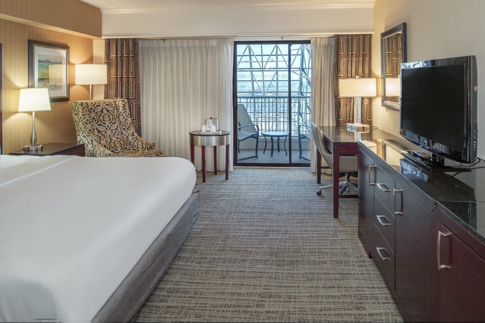 Premium Room, 1 King Bed, Balcony (Interior Balcony) | Pillowtop beds, in-room safe, desk, laptop workspace