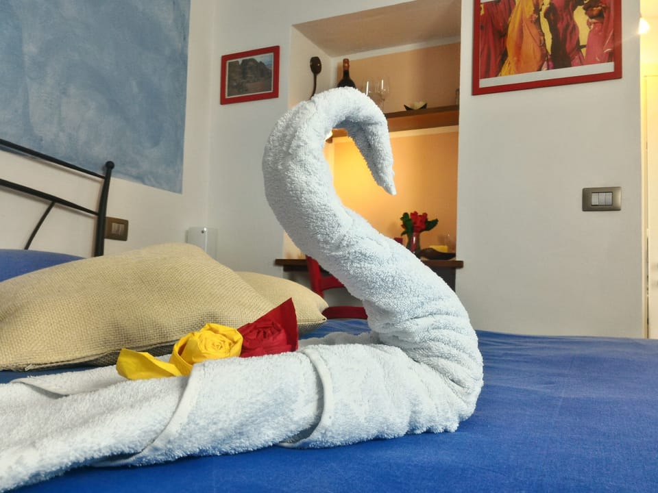 Double Room, Garden View | Down comforters, individually decorated, iron/ironing board, free WiFi