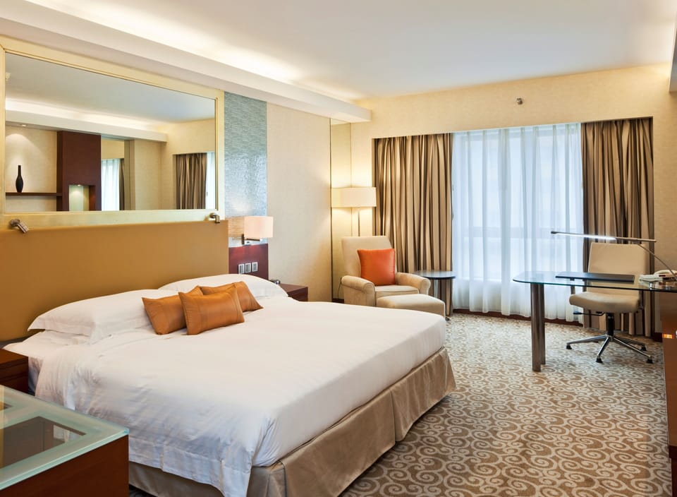 Premium bedding, down comforters, in-room safe, desk