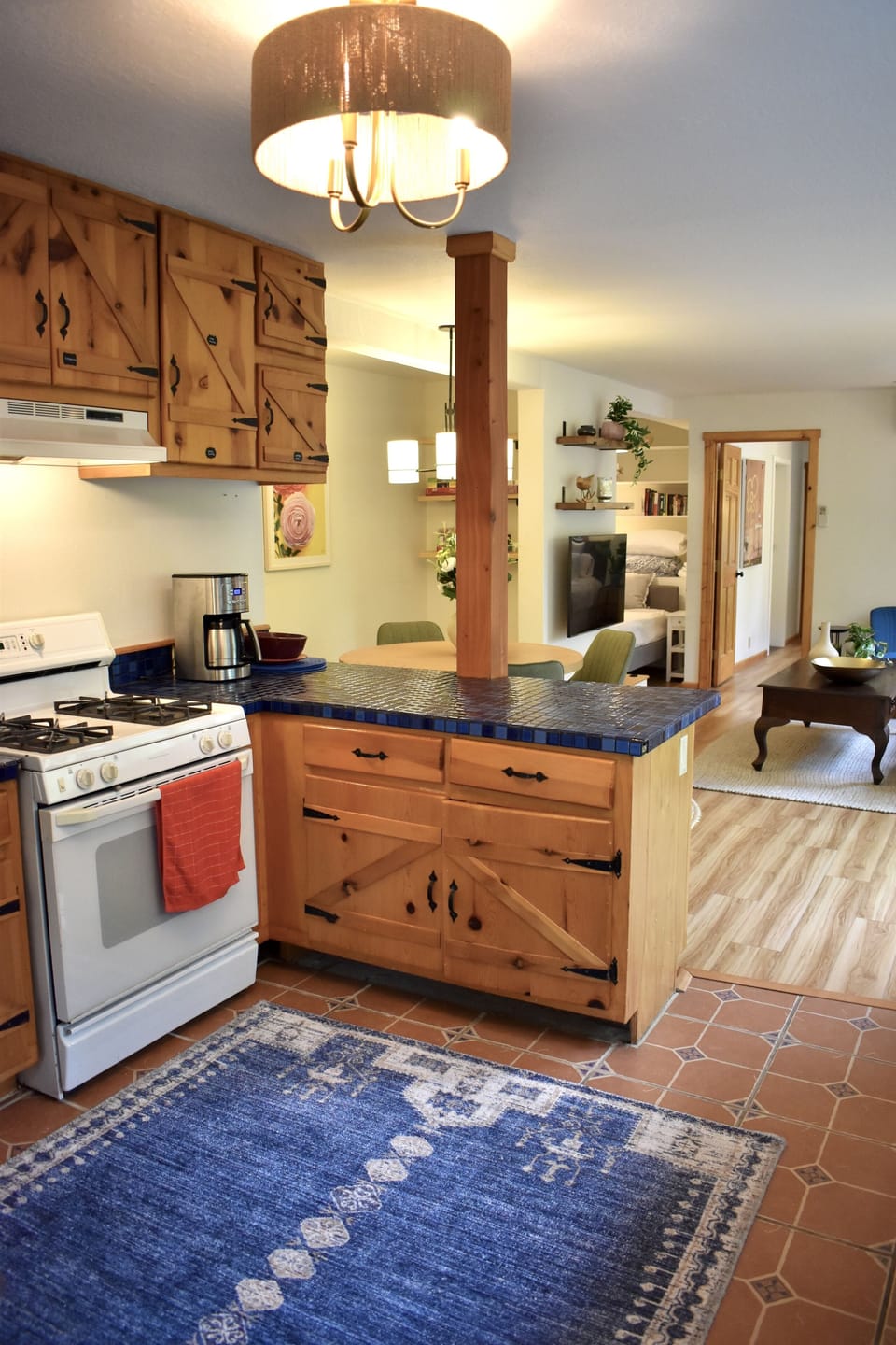Cool original kitchen, handmade oak cabinets and tile floor. Lots of character.
