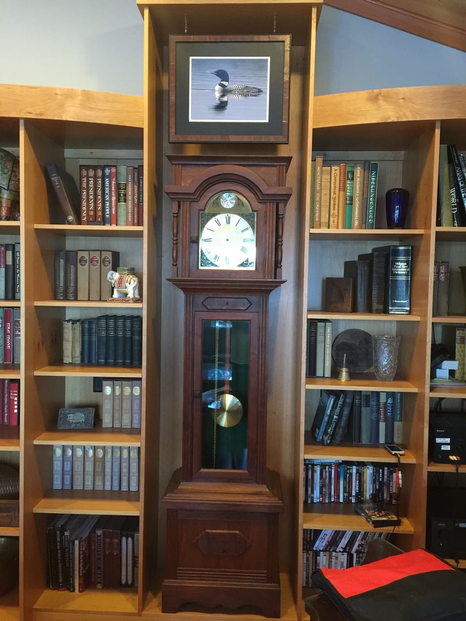 Living Room Library and my grandmother's hand made walnut grandfathers clock.