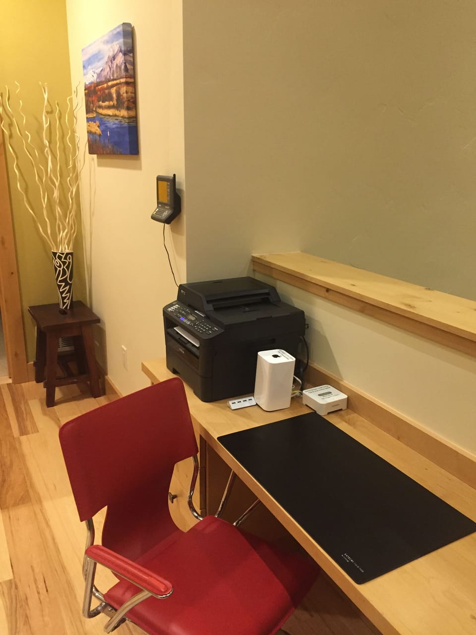 "Work" desk - Brother Laser printer/copier/scanner; Weather station on the wall