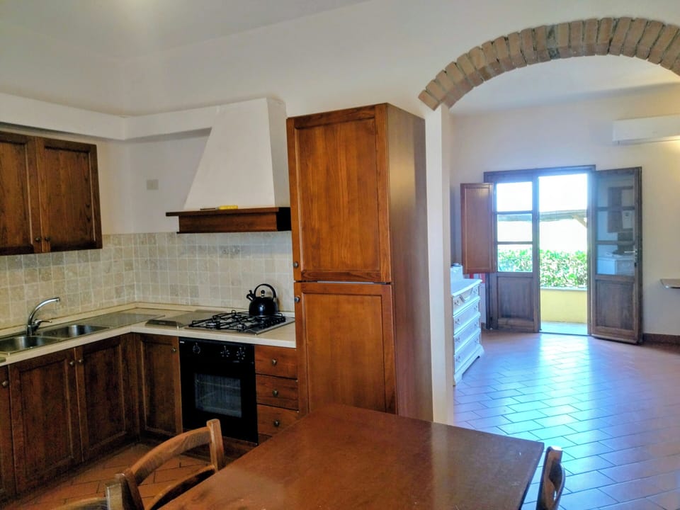 Condo, Multiple Beds (Fienile) | Private kitchen | Full-size fridge, oven, stovetop, cookware/dishes/utensils
