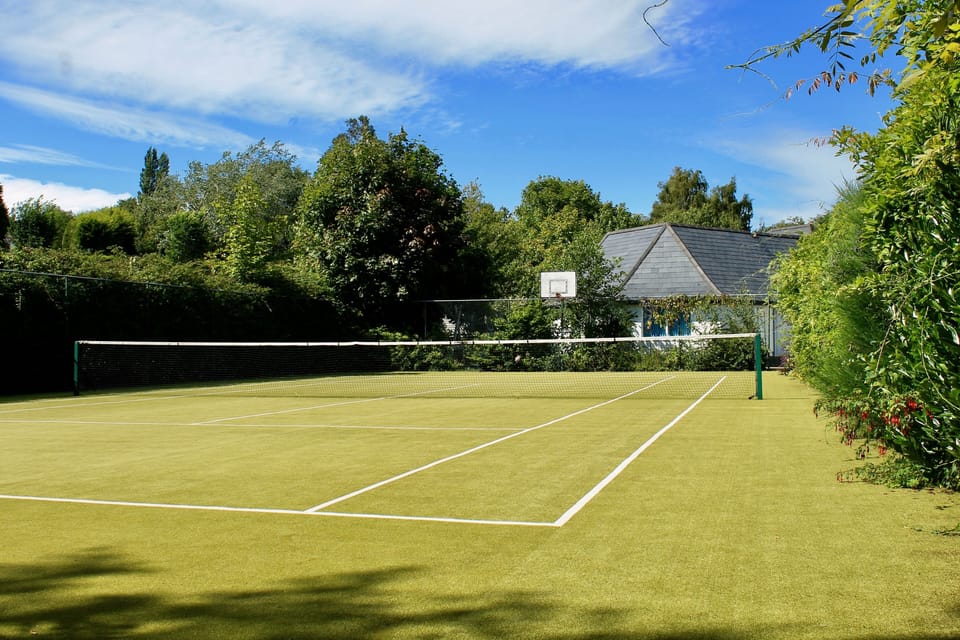 Private all-weather tennis court. 
(Rackets & balls provided)