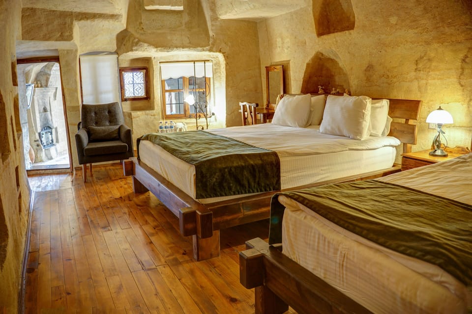 King Cave Suite | Egyptian cotton sheets, premium bedding, memory foam beds, minibar