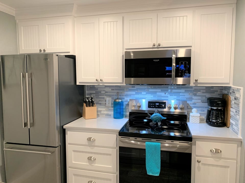 Kitchen with new stainless steel appliances