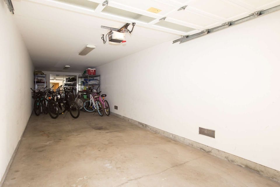 There is a garage with parking for one vehicle....all those bikes are for you to use!