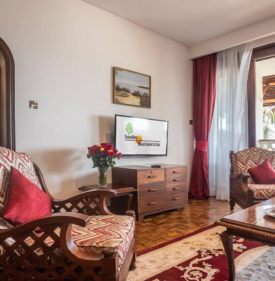Junior Suite | Living area | 32-inch Smart TV with cable channels, TV