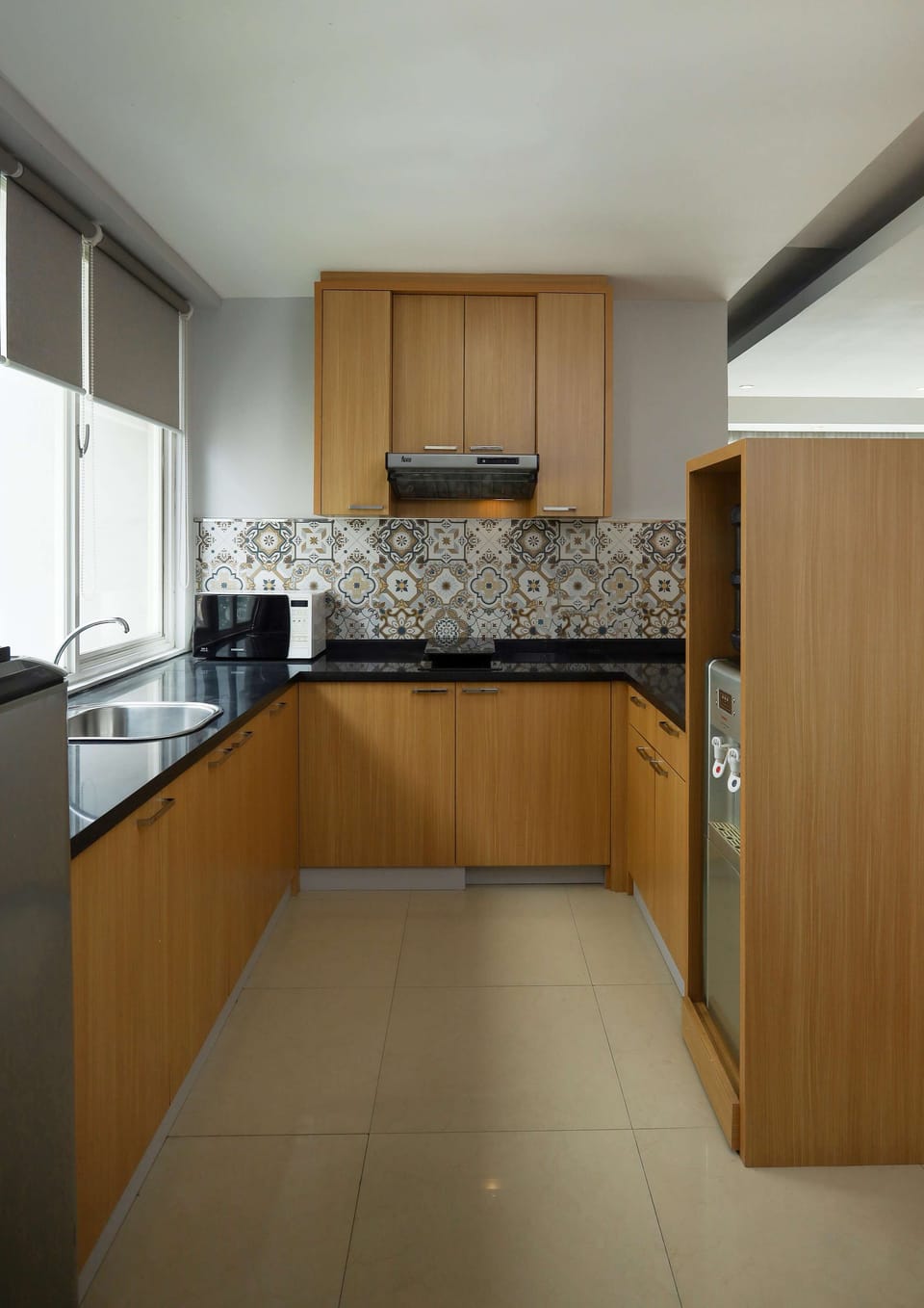 Suite, Multiple Beds | Private kitchenette | Coffee/tea maker, fridge, eco-friendly cleaning products