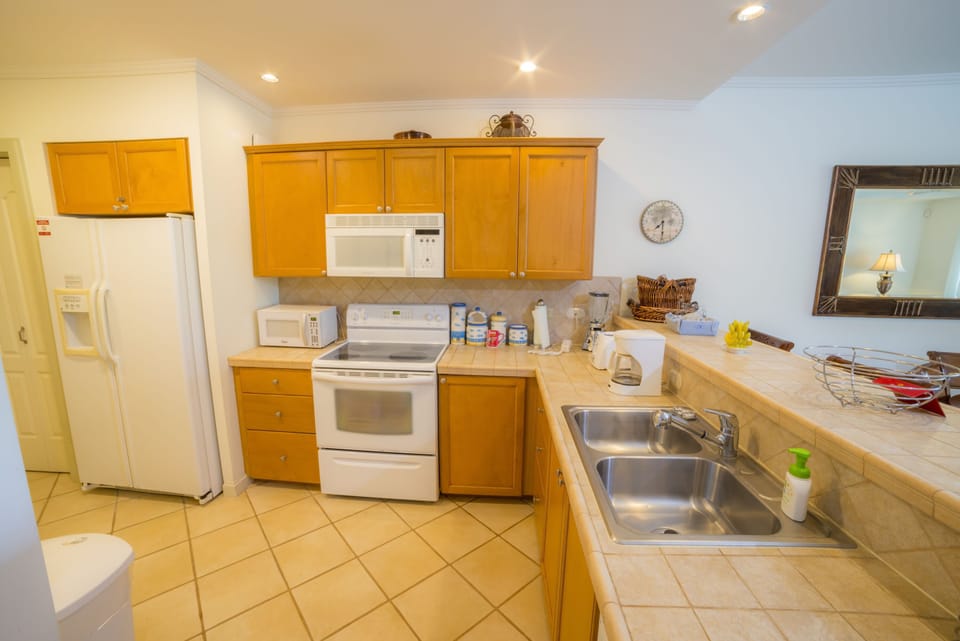 Condo, Multiple Beds (Los Suenos Resort Del Mar 3I) | Private kitchen | Coffee/tea maker, full-size fridge, microwave, oven