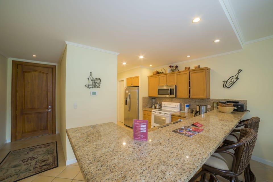 Condo, Multiple Beds (Los Suenos Resort Del Mar 4G) | Private kitchen | Coffee/tea maker, full-size fridge, microwave, oven