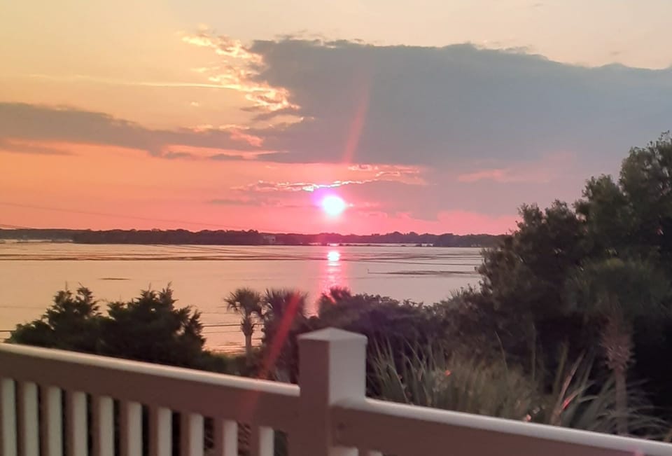 Summer time sunset taken from the balcony. 