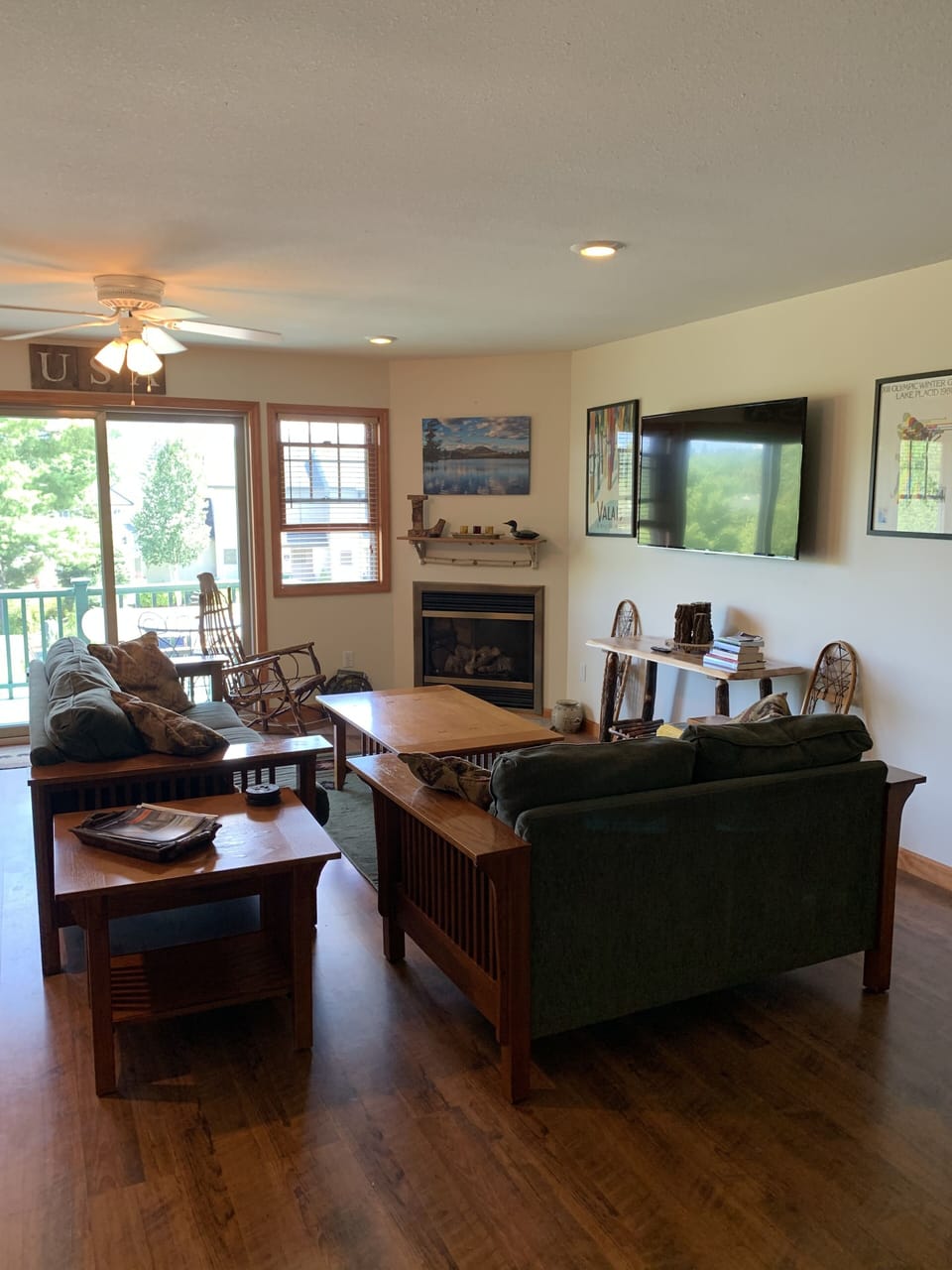 Living area with sliding glass door to front deck.