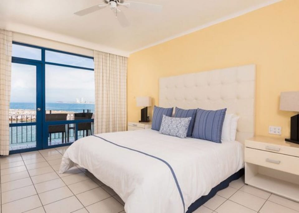 The bedroom has a full private bathroom, and a king size bed.
