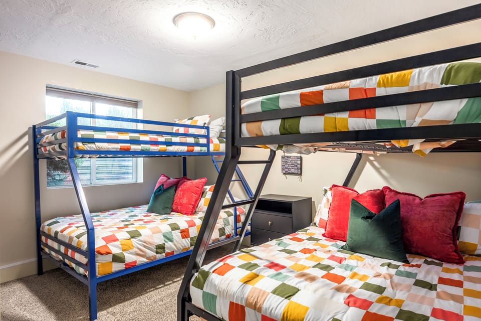 #6- Bedroom (2 bunk beds. Bottoms full, tops twins) Located in Basement.