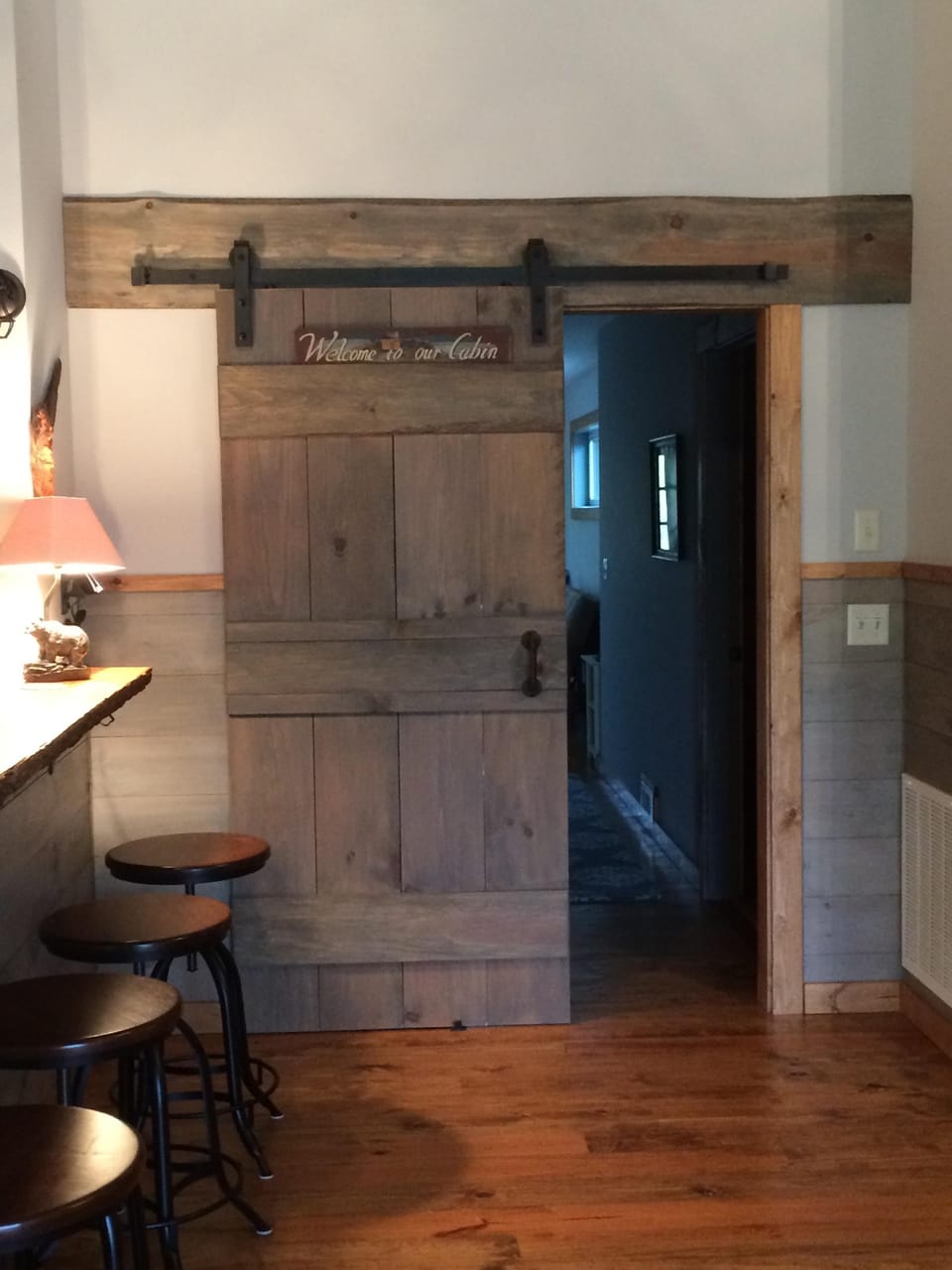 Sliding barn door from living area to hallway