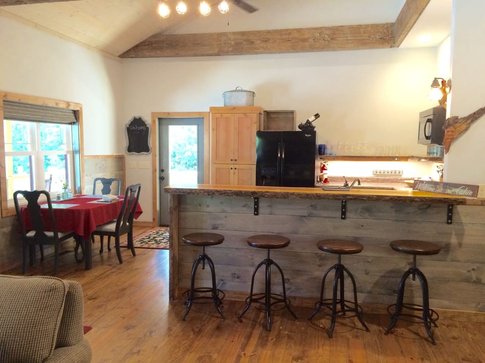 kitchen and bar area as viewed from living area