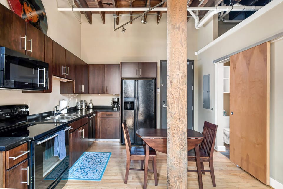 Full kitchen with standard drip coffee maker.