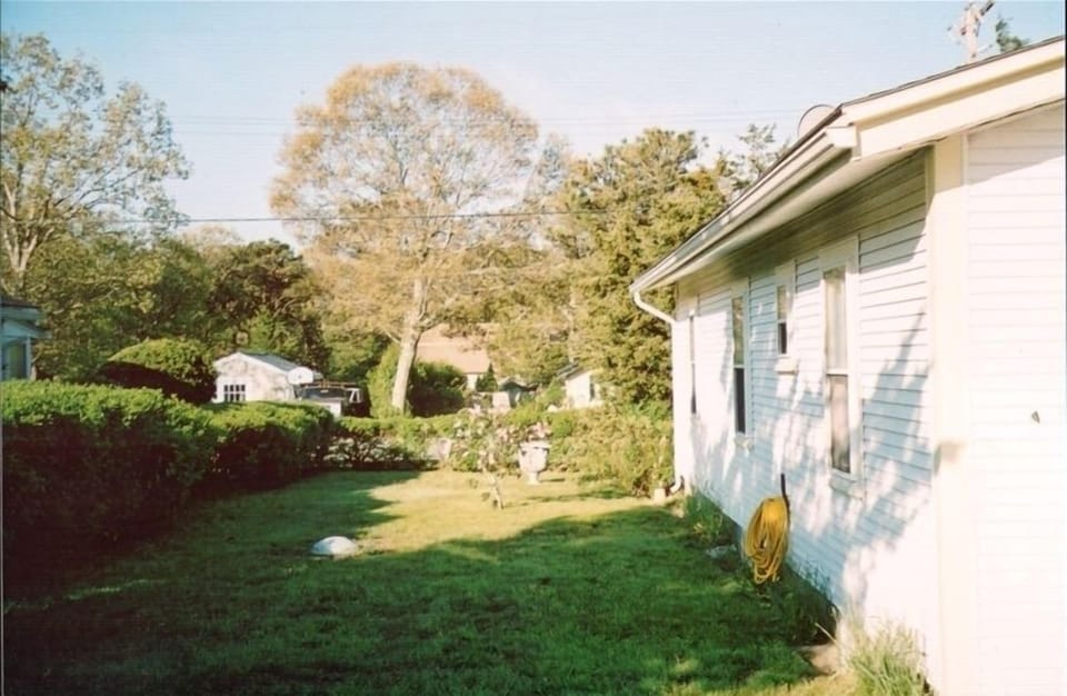 Side View of Home with Large Enclosed Yard