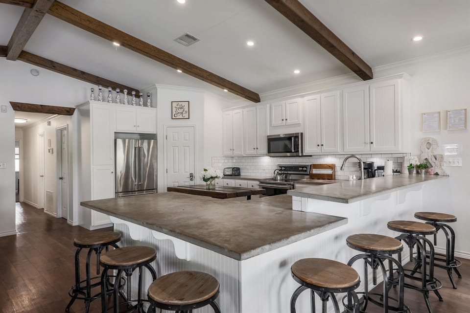 Spacious kitchen with open floor plan and lake views