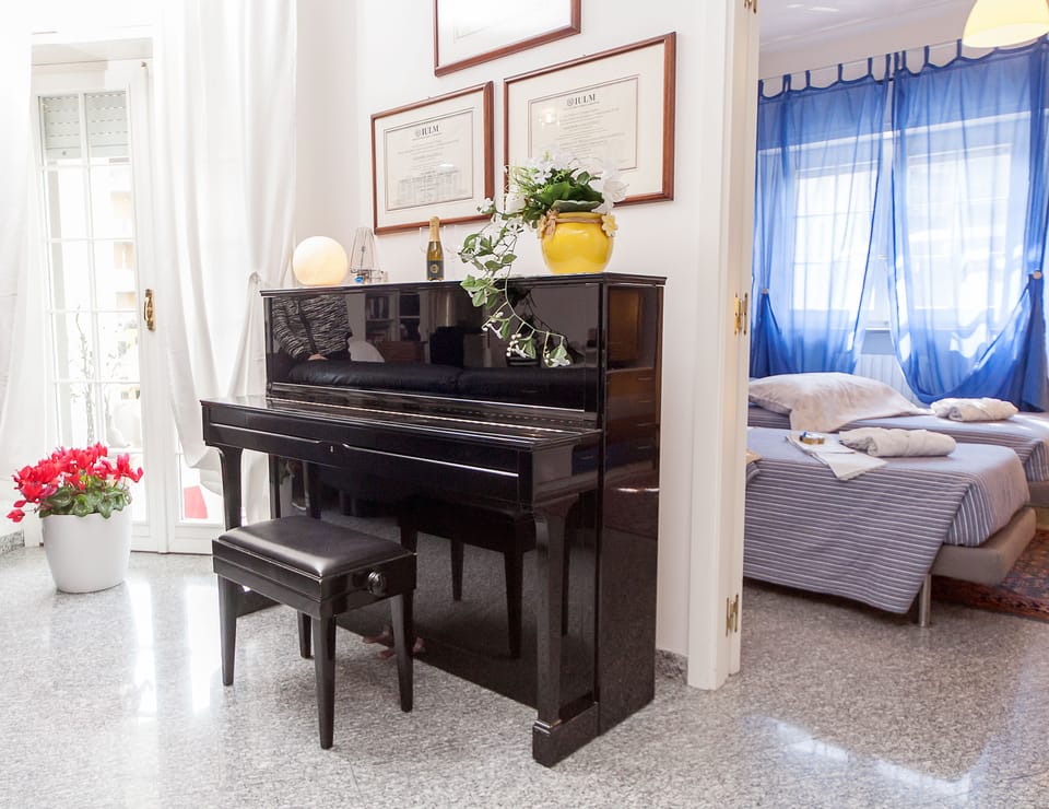 Double or Twin Room, Private Bathroom (External) | Desk, blackout drapes, iron/ironing board (on request), WiFi (free)