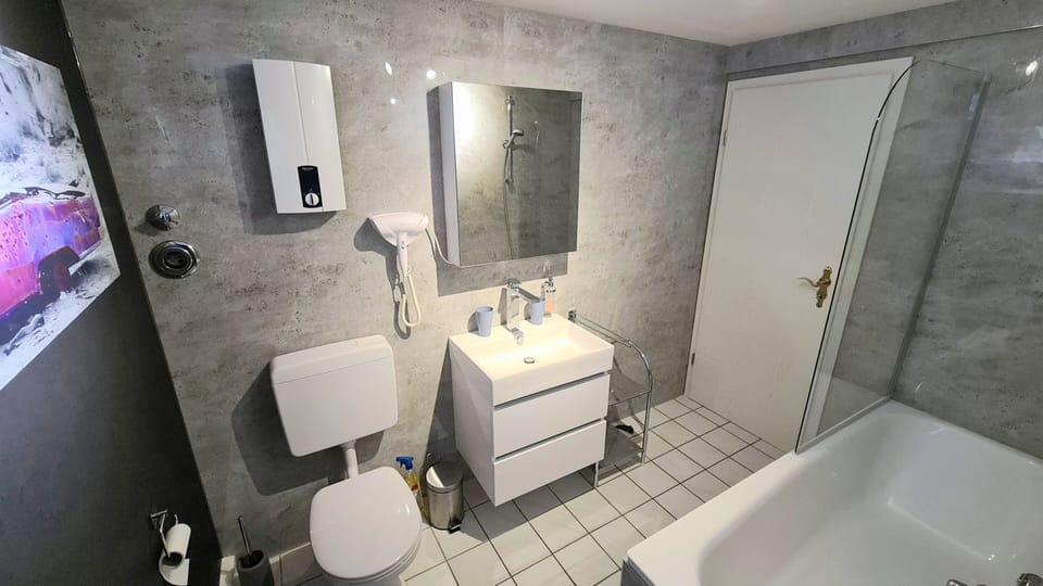 Comfort Apartment, Ground Floor (Parklife Apartment - PLA 50) | Bathroom | Hair dryer, slippers, towels, shampoo