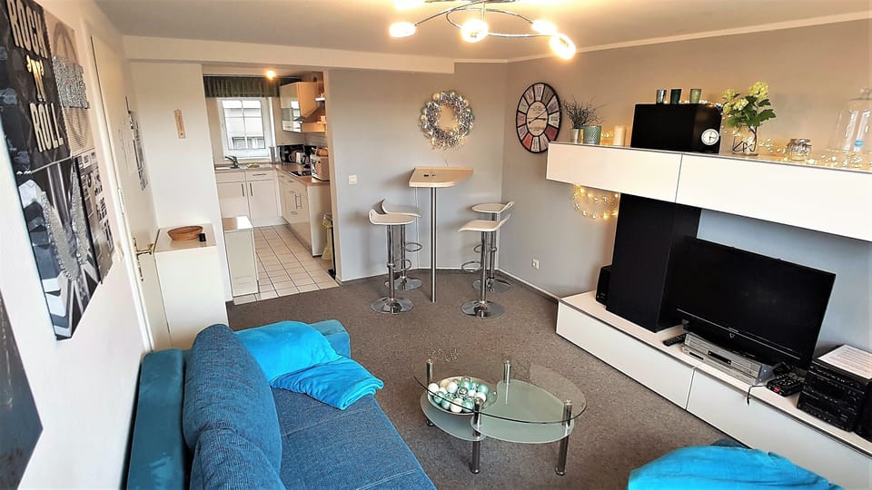 Comfort Apartment, Park View, Ground Floor (Parklife Apartment - PLA 47) | Living area | Books, stereo