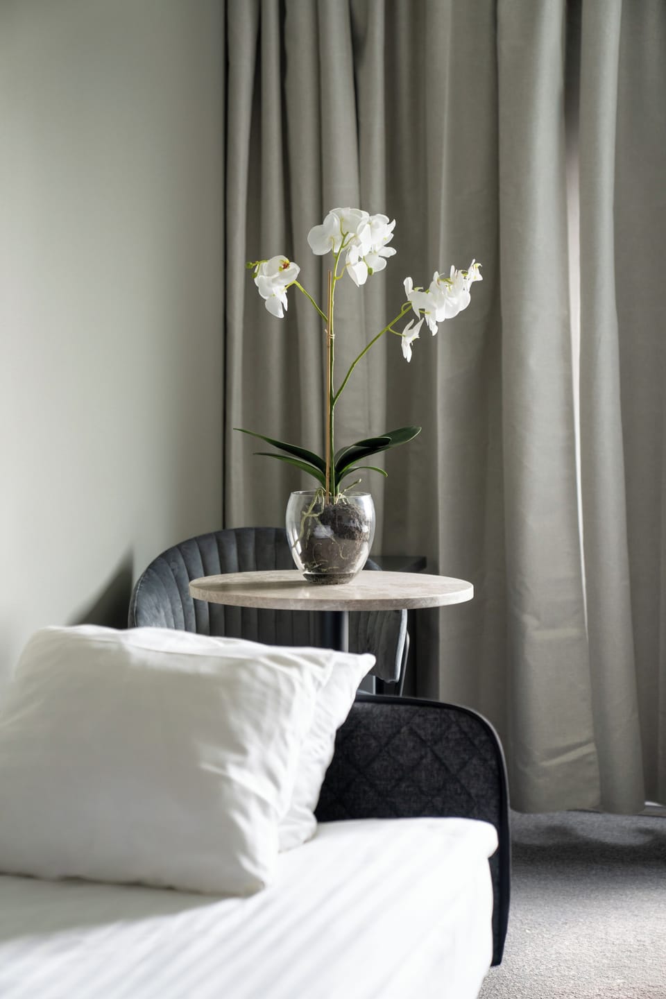 Pillowtop beds, desk, blackout drapes, iron/ironing board (on request)