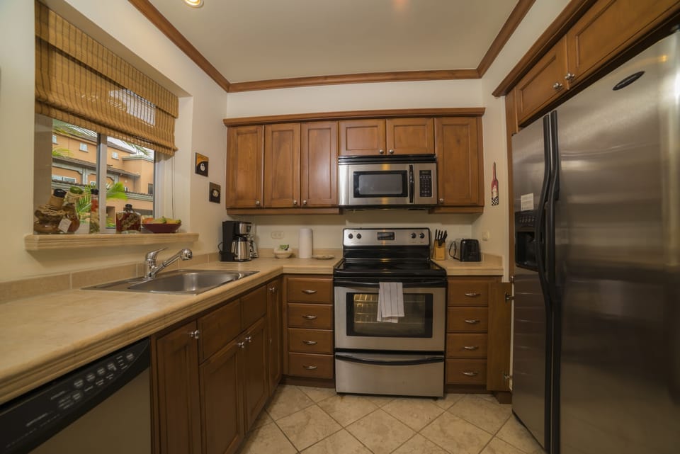 Condo, 1 King Bed (Los Suenos Resort Veranda 5E) | Private kitchen | Coffee/tea maker, full-size fridge, microwave, oven