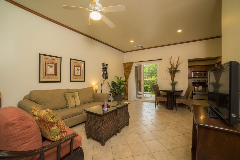 Condo, 1 King Bed (Los Suenos Resort Veranda 5E) | Living room | Flat-screen TV