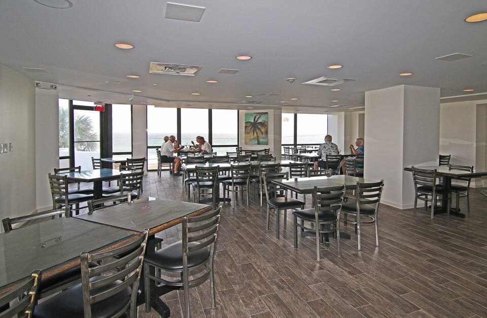 Main dining room of The Royal Palm Grille Restaurant. Large bar area in front!