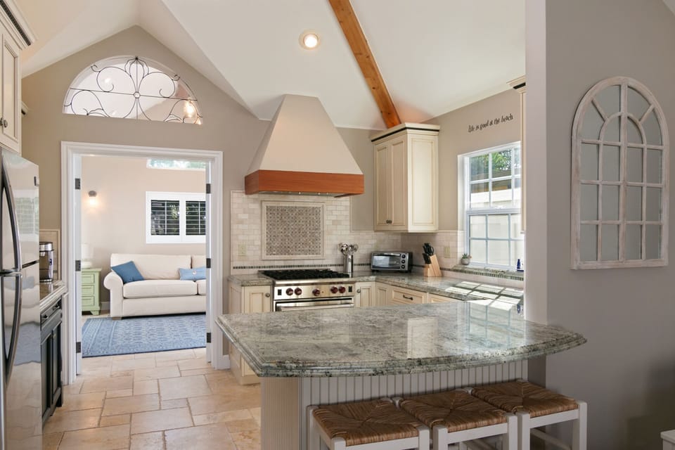Beautiful Kitchen with Wolf Range & Granite Counter Tops