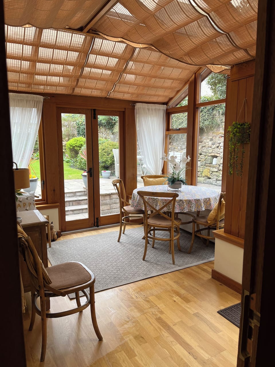 Dining Conservatory leading to private garden .