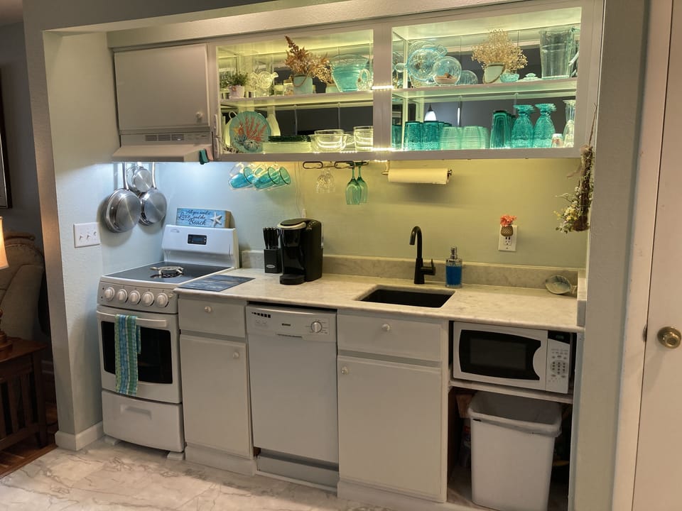 Beautiful new white, bright flooring and kitchen