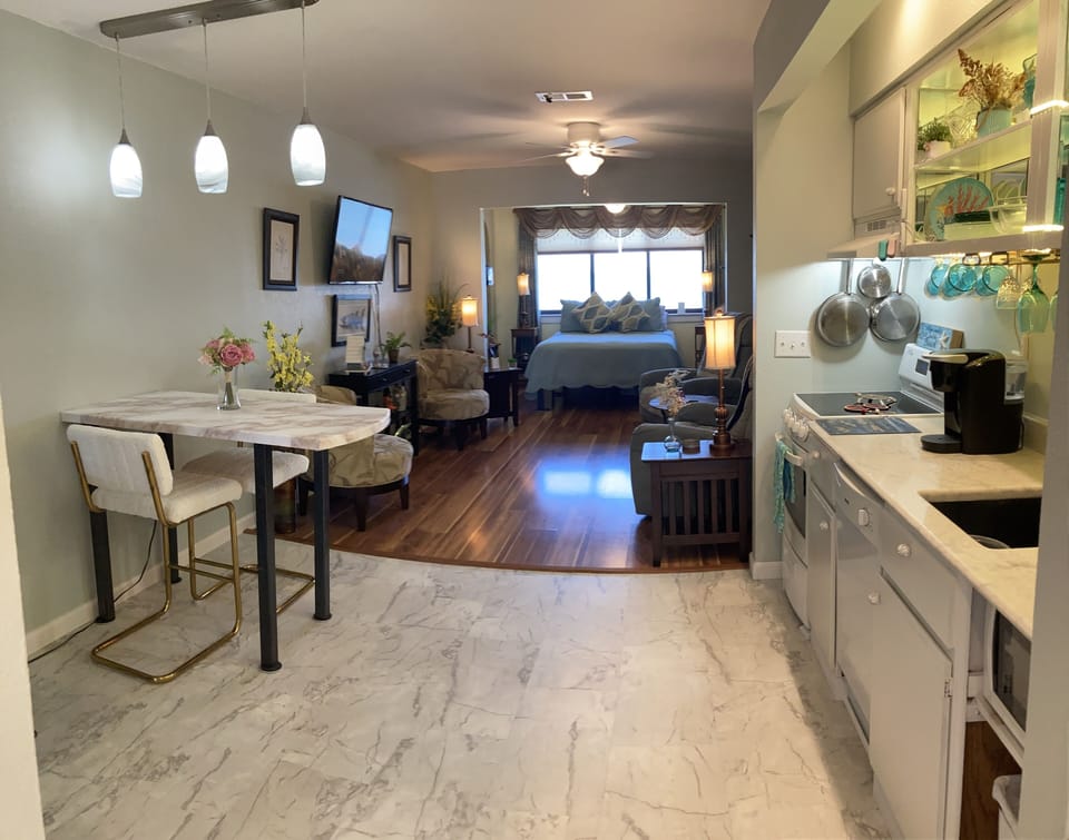 Beautiful white, bright flooring and kitchen