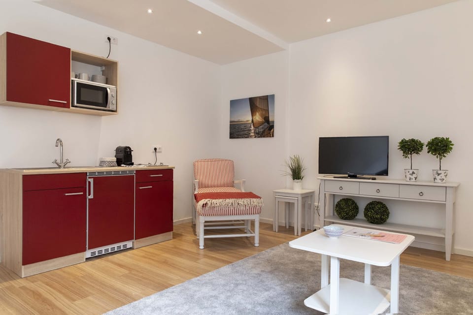 Apartment, 2 Bedrooms | Living area | Flat-screen TV, iPod dock