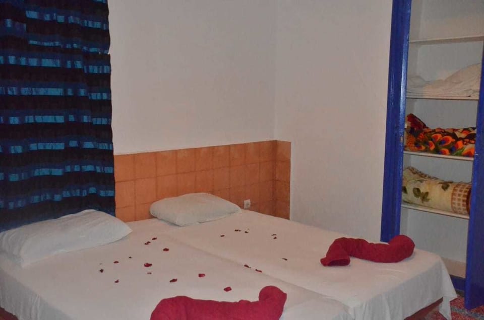 Room, Shared Bathroom | In-room safe, blackout drapes, iron/ironing board, free WiFi