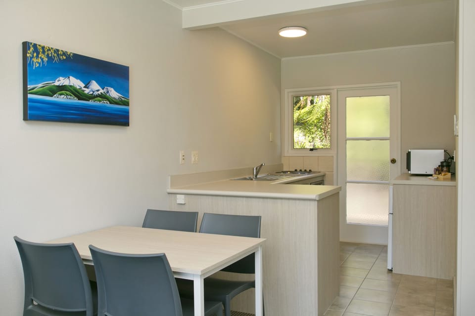 Apartment, 2 Bedrooms, Poolside | Living room | 42-inch Smart TV with digital channels, TV, Netflix